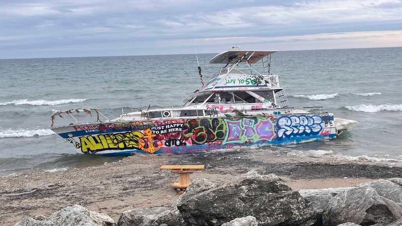 High Winds Postpone Removal of Abandoned Boat on Milwaukee’s Lake Michigan Shore