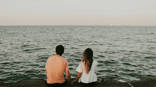 Couple looking at lake view