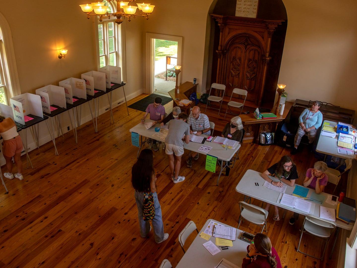 Gov. Evers disputes Madison’s argument that absentee voting is a privilege