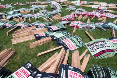 August 19, 2024 – Chicago, Illinois: Signs on the ground at Union Park in Chicago before for the March on the DNC 2024.
