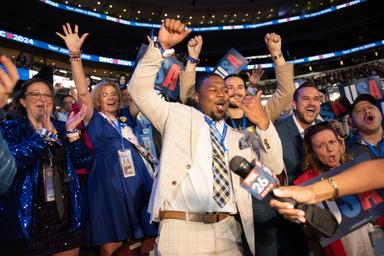 August 20, 2024 – Chicago, Illinois: Texas delegates make some noise during a live shot at the Democratic National Convention.