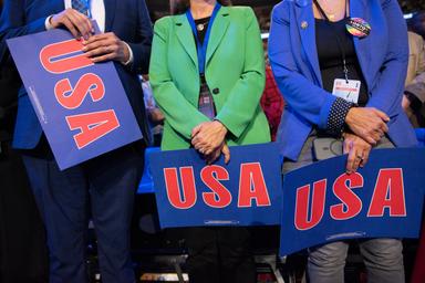 August 21, 2024 – Chicago, Illinois: USA sign held by delegates on the floor of the Democratic Convention.
