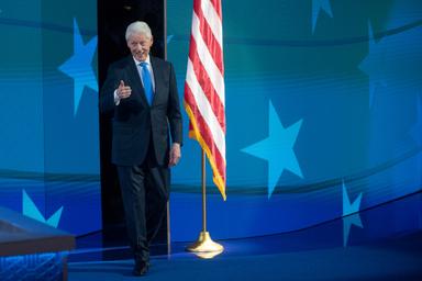 August 21, 2024 – Chicago, Illinois: Former President Bill Clinton enters the stage area before his speech on the third night at the Democratic National Convention in Chicago.