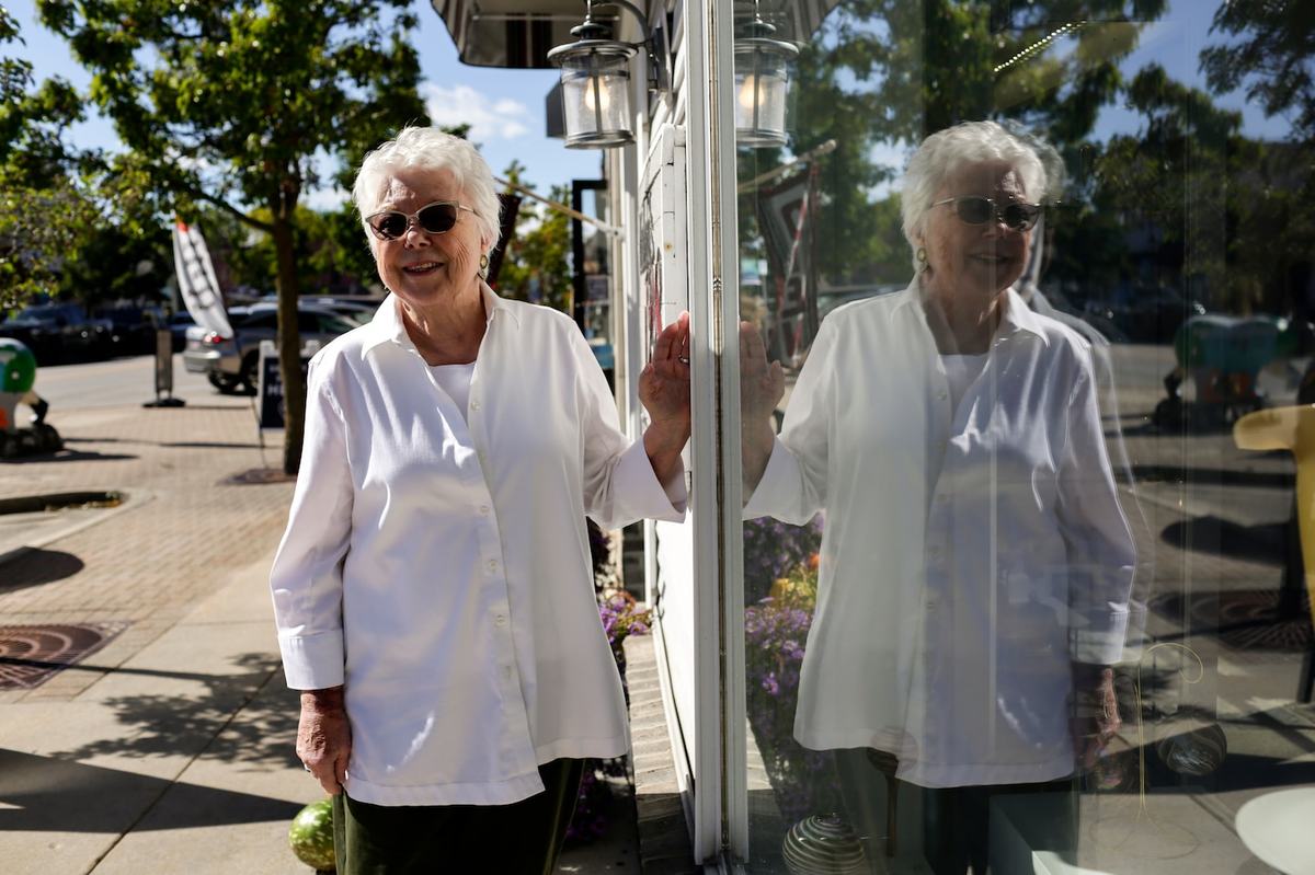 Mullaly’s 128 Gallery owner Barb Mullaly poses for a portrait outside of the gallery on Friday, Oct. 9, 2026, in Elk Rapids. Mullaly is one of more than 1,600 voters whose status was questioned. (Kristen Norman for Votebeat)