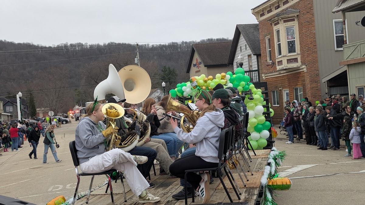 A band plays from a float during the Avoca St. Patrick's Day Parade 2025.