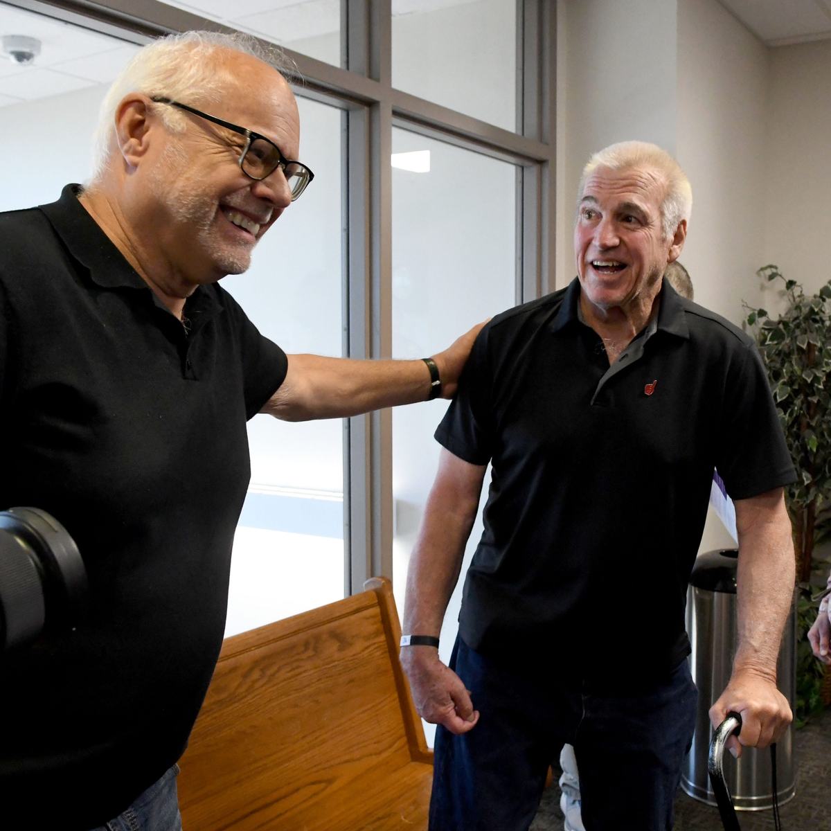 Jim Spodick, left, congratulates Harry Wait after Wait's sentencing on June 2, 2026