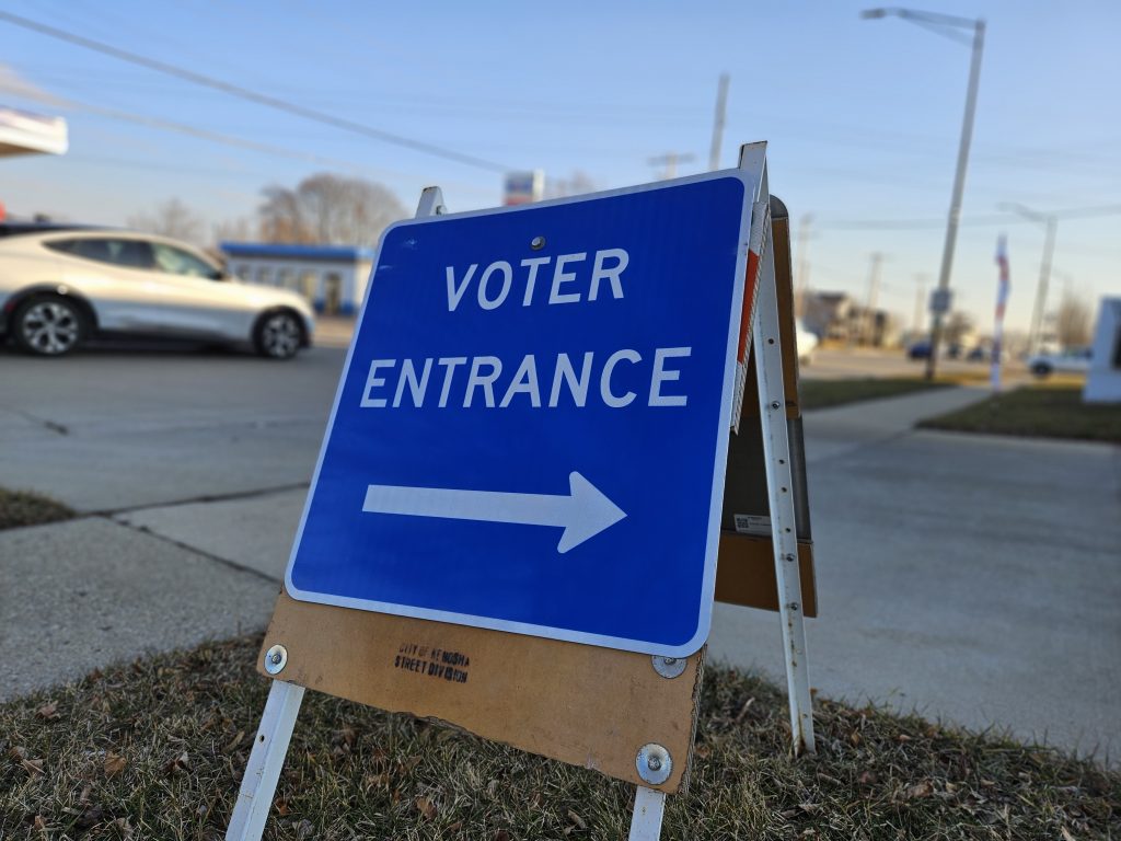 A voter entrance sign in Racine, Wis. on Feb. 20, 2024.