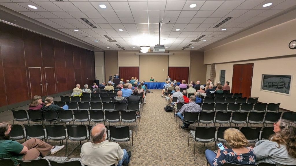 Rebecca Cooke, Katrina Shankland, and Eric Wilson, Democratic candidates for the 3rd Congressional District seat in Wisconsin, speak at a forum at UW-Platteville on June 12, 2024.