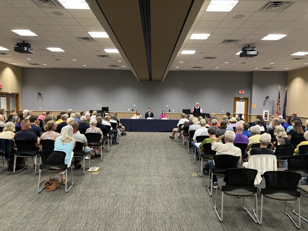 Democratic candidates for Congress appear at a forum at Chippewa Valley Technical College in Eau Claire, Wis. on July 16, 2024. The candidates are Rebecca Cooke, Katrina Shankland, and Eric Wilson.