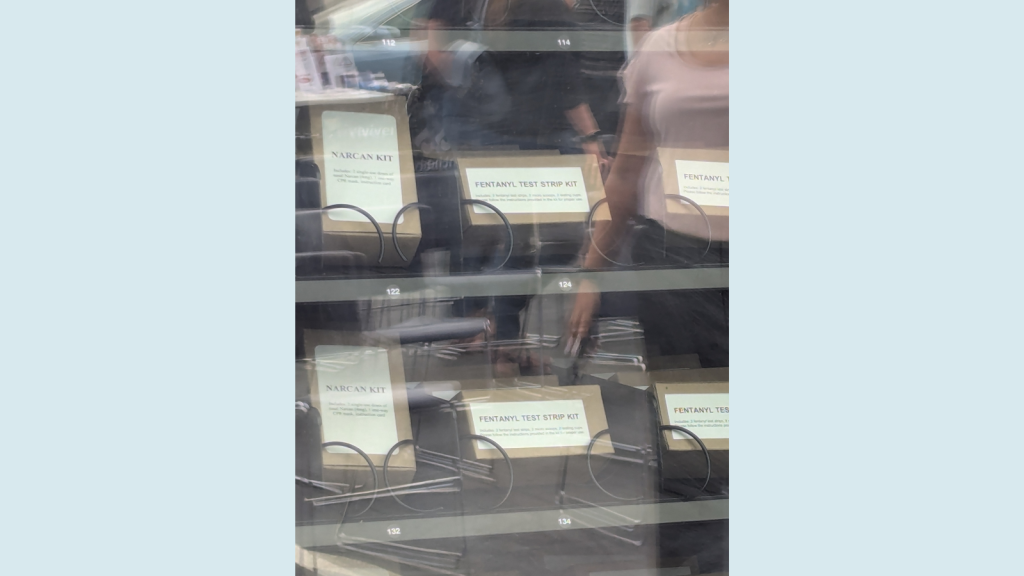 Public Health Vending Machines close up view showing fentanyl test strips and Narcan kits.