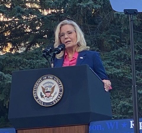 Liz Cheney speaking at the podium