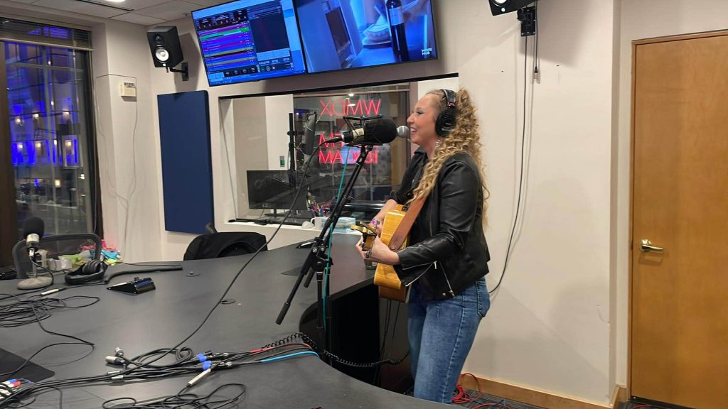 Lo Marie performing in the Lair at the WMDX studio on State Street in Madison