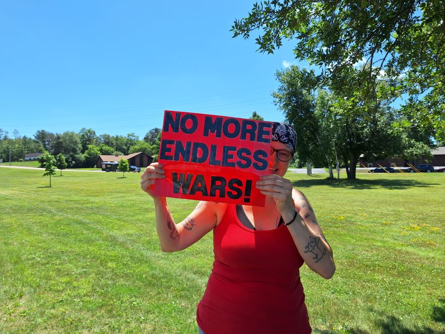 Sign reading No More Endless Wars!