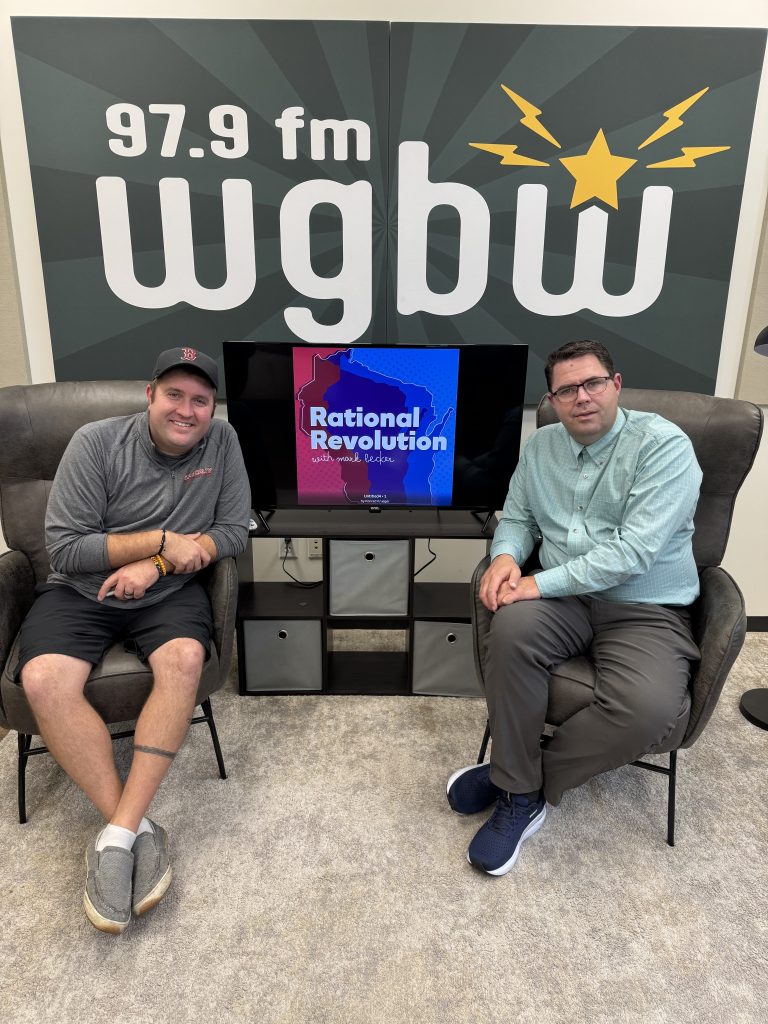 Rational Revolution host Mark Becker and Daniel Olson in WGBW studio posing in chairs for the photo