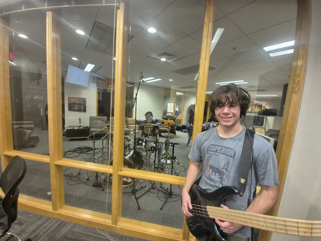 Jordan and drumset in the lobby, Huck in the studio