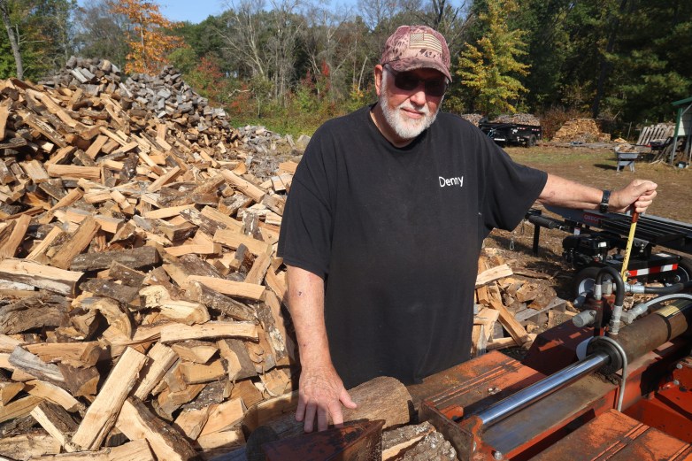 A person wearing a shirt that reads